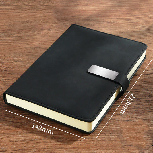 Black A5 notebook with a silver-tone flat-buckle closure; supplier diagram labels 213 mm by 148 mm.